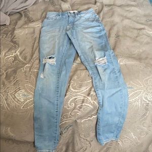 Light wash ripped denim jeans